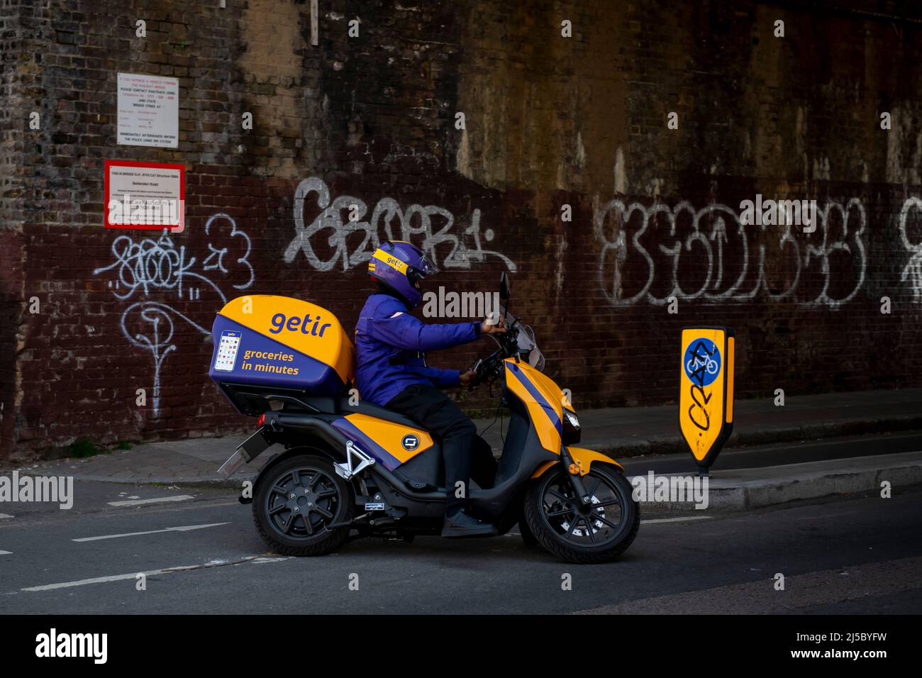 A Getir courier on a moped Stock Photo