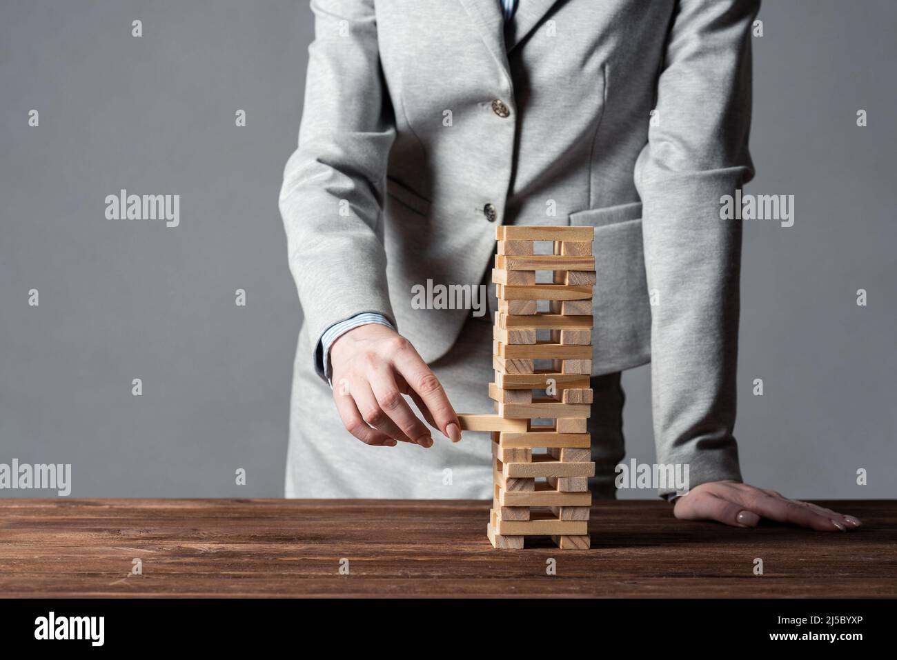 Removing block tower hi-res stock photography and images - Alamy