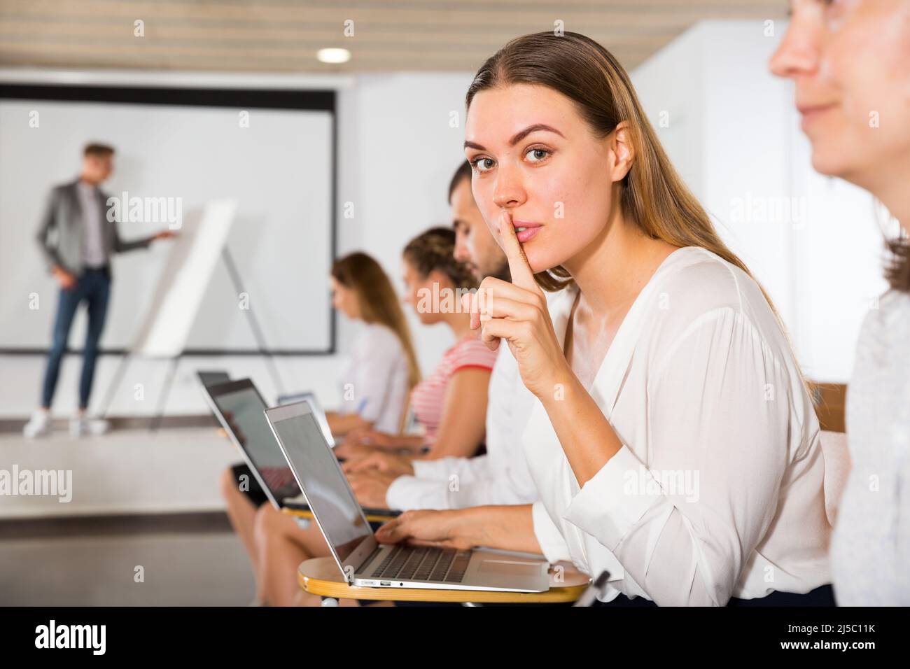 Woman showing silence sign Stock Photo