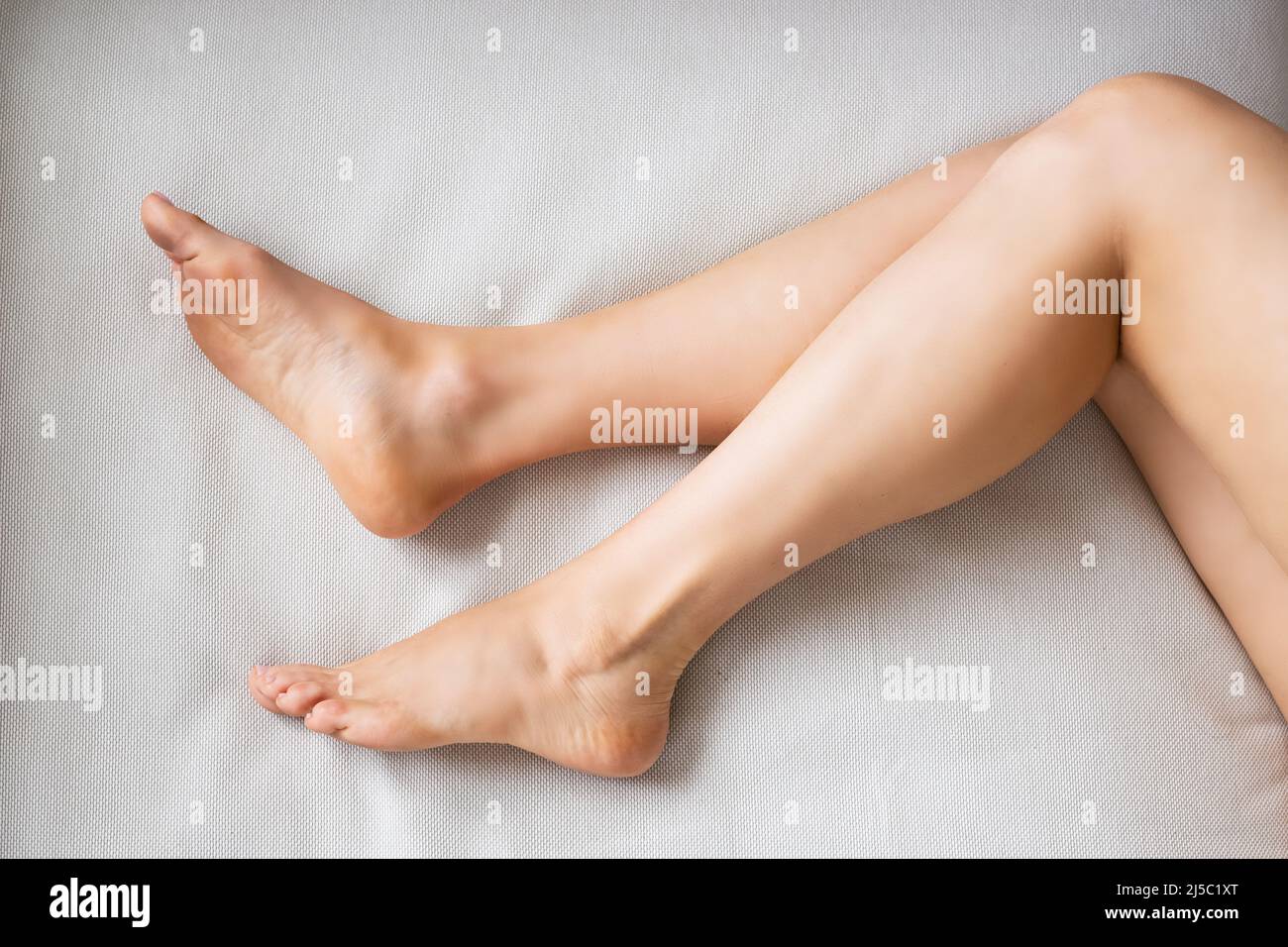 Beautiful Woman Legs Epilation And Spa Waxing Stock Photo