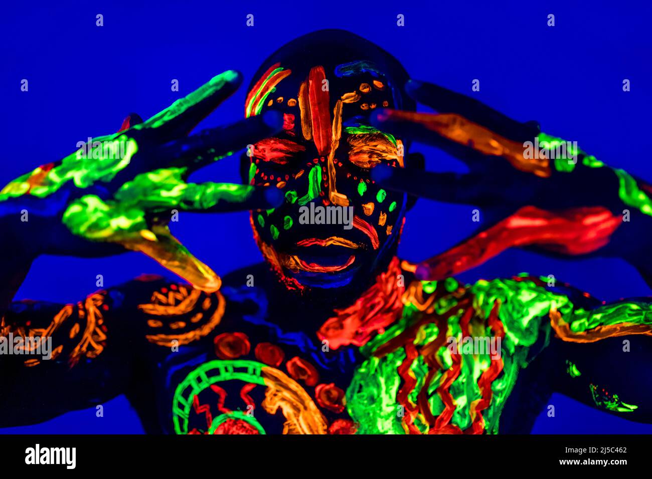 Uv light fluorescent blue man hi-res stock photography and images - Alamy
