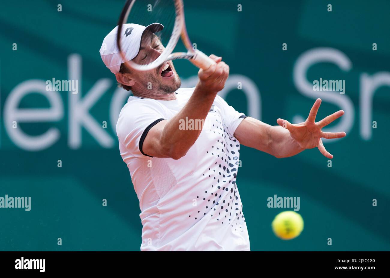 Belgrade, Serbia, 20th April 2022. John Millman of Australia returns