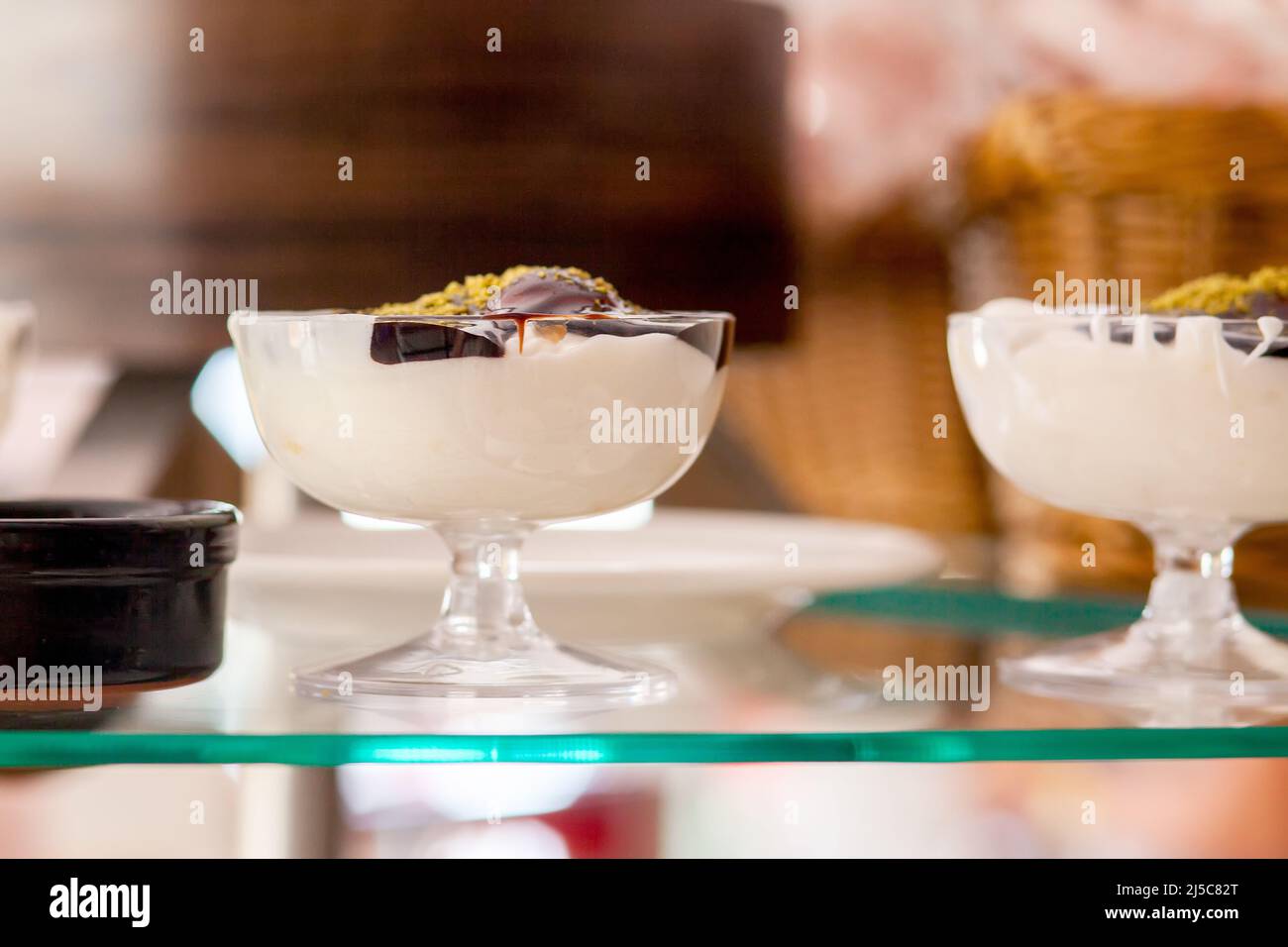 Pudding dessert in a cream bowl. Dessert table in a Turkish hotel ...