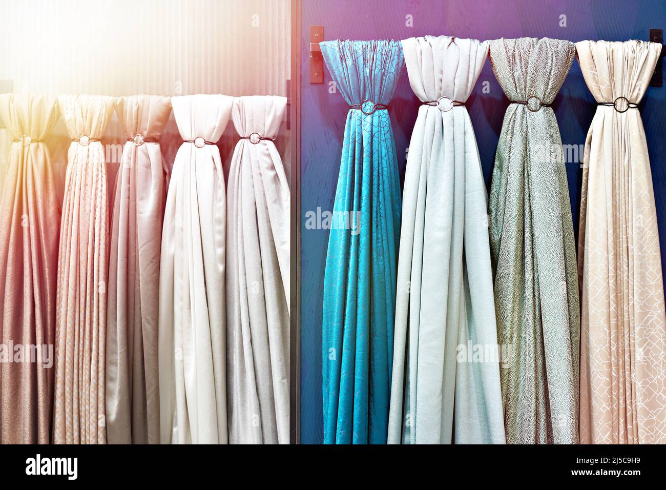 Fabrics for curtains in household store Stock Photo