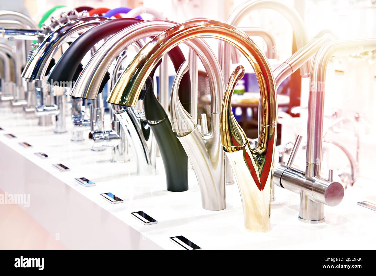 Modern kitchen water taps in the store Stock Photo