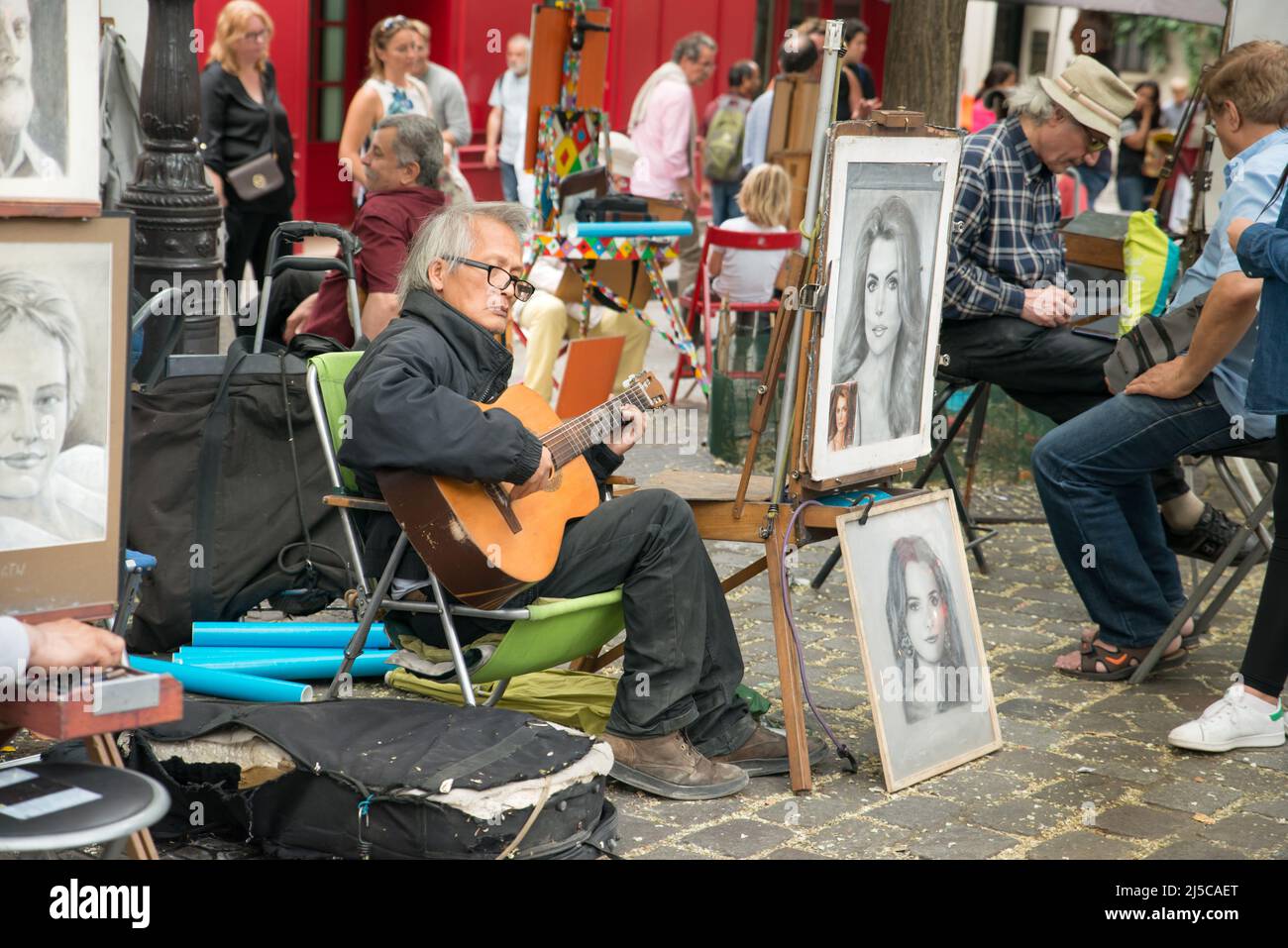 Montmartre Paris, painter at the place du tertre, tourism attraction in France, artists drawing portraits, Paris at the Montmartre on the 04.08.2017 Stock Photo