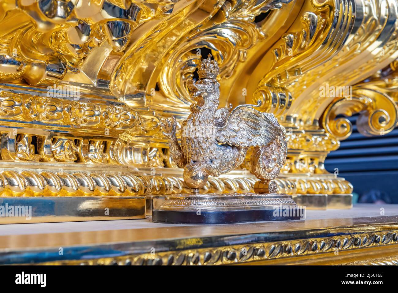 Golden Knocker (llamador) in the front of a paso (Platform or throne) of Holy Week Stock Photo