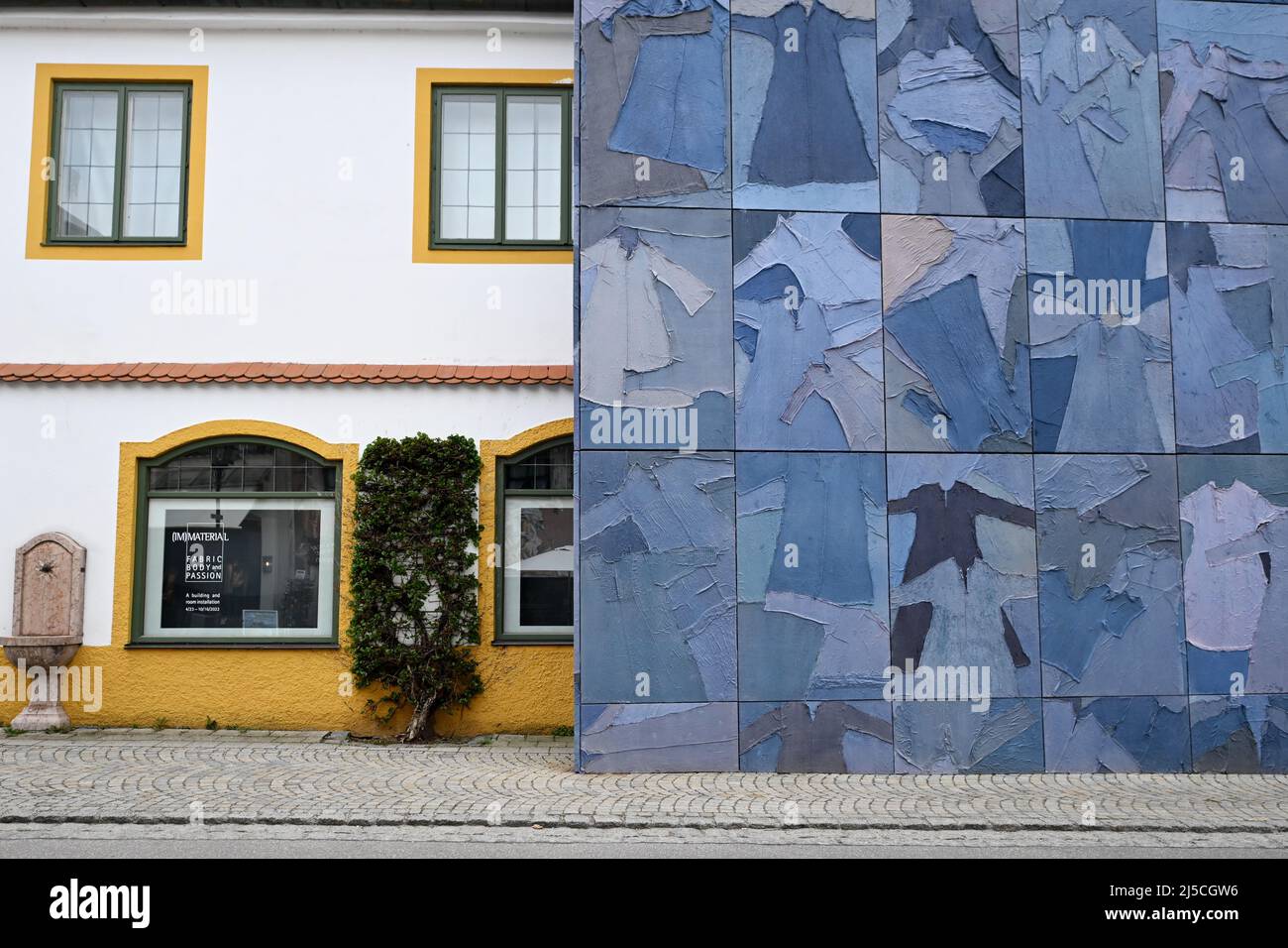 Oberammergau, Germany. 22nd Apr, 2022. From more than 1000 garments of the  Passion 2000 and 2010, the Museum Oberammergau has built a cube around the  house. Until October 16, 2022, the "(IM)MATERIELL -