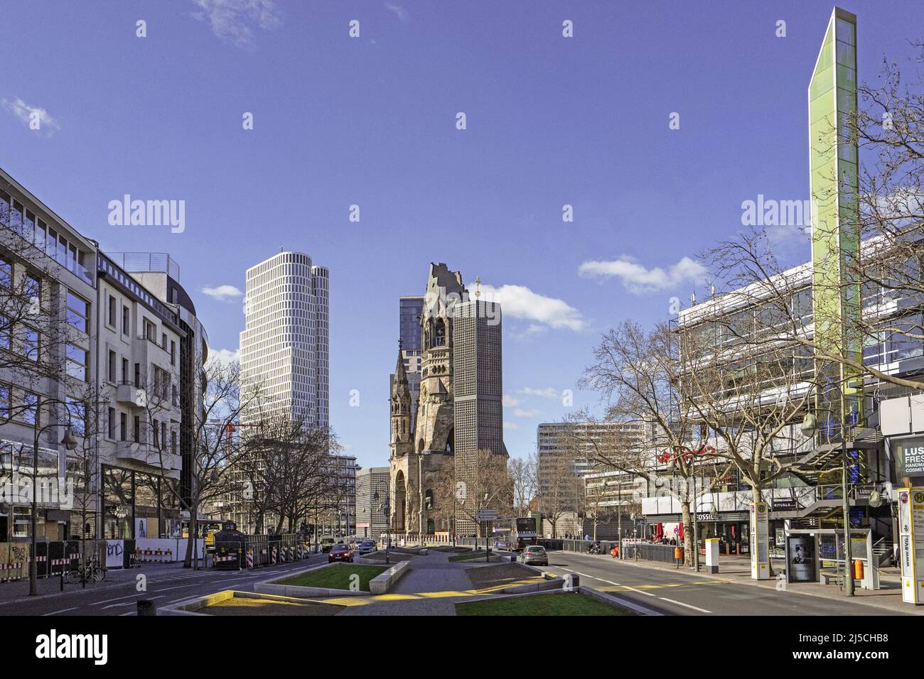 Germany, Berlin, 22.03.2020. Tauentzienstrasse in the time of the Corona Virus Pandemic on 22.03.2020. With the Hotel Berlin Upper West Motel One (left) and the Kaiser Wilhelm Memorial Church and rightmost: the Glaeserne Obelisk, the 35 meter high column was designed in 1987 by Heinz Mack, the co-founder of the artist group Zero. At that time it was the first glazed obelisk in the world. [automated translation] Stock Photo