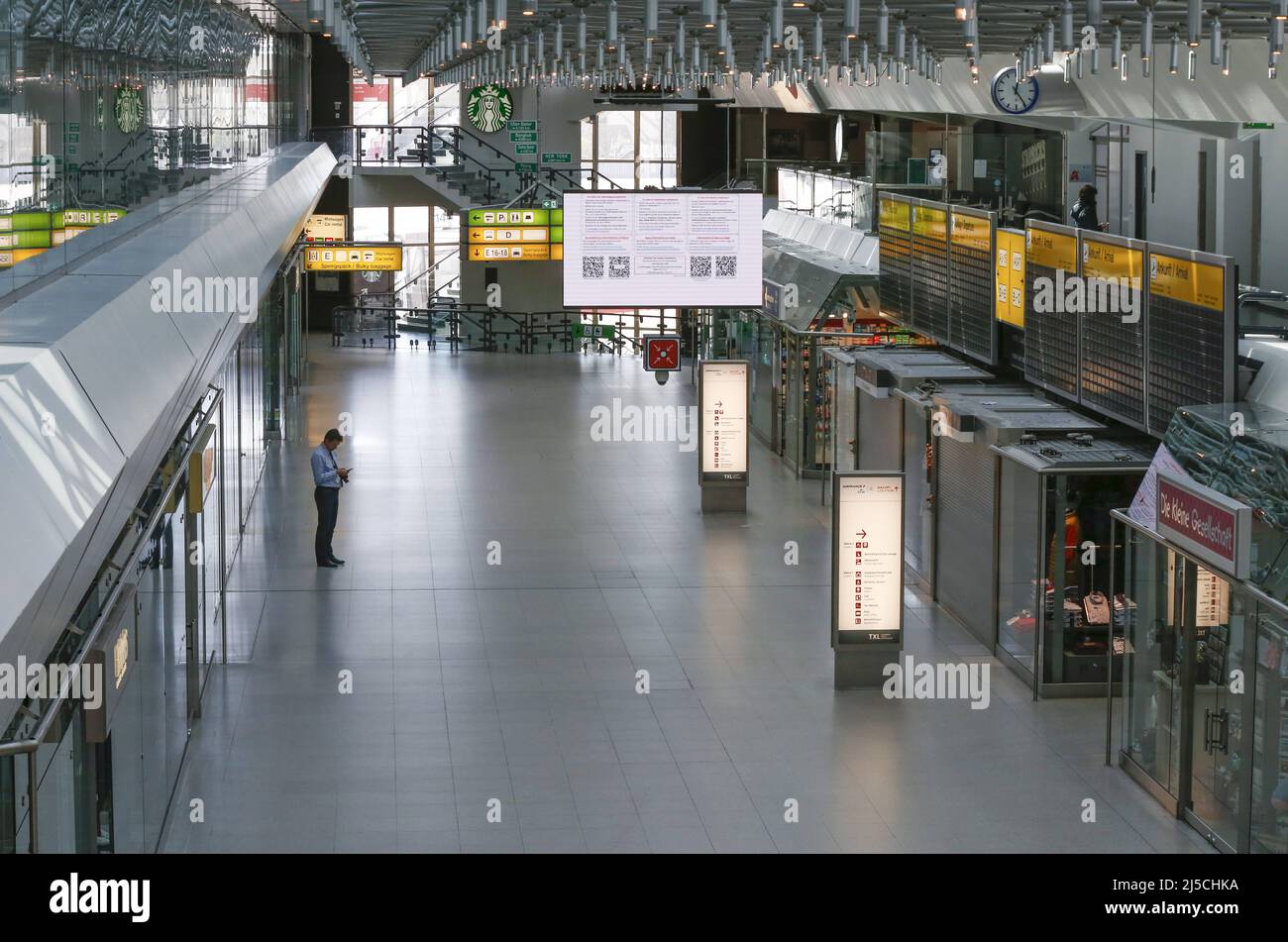 A ghostly empty Berlin Tegel Airport. Passenger traffic has plummeted by more than 90 percent due to the coronavirus. Terminal A in Tegel is silent. No planes are taking off or landing here. [automated translation] Stock Photo