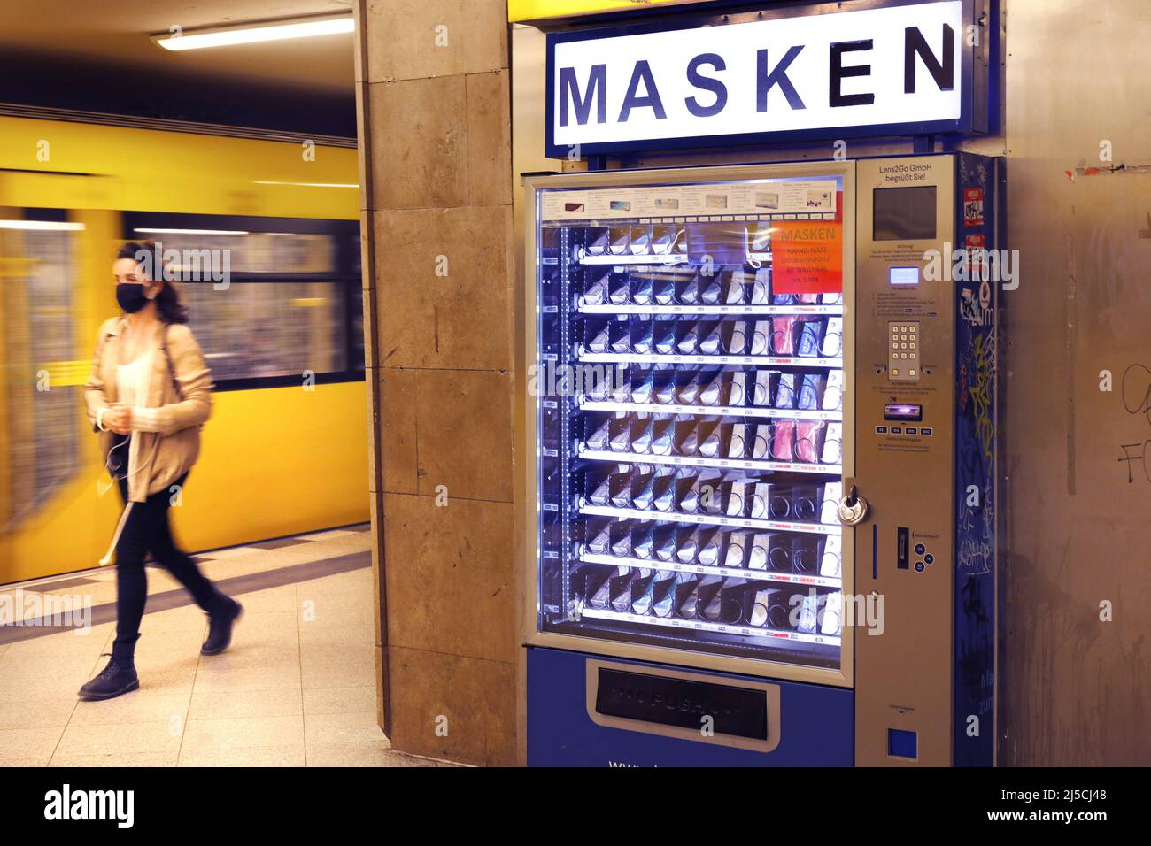 Vending machine with protective masks in a Berlin subway station. In