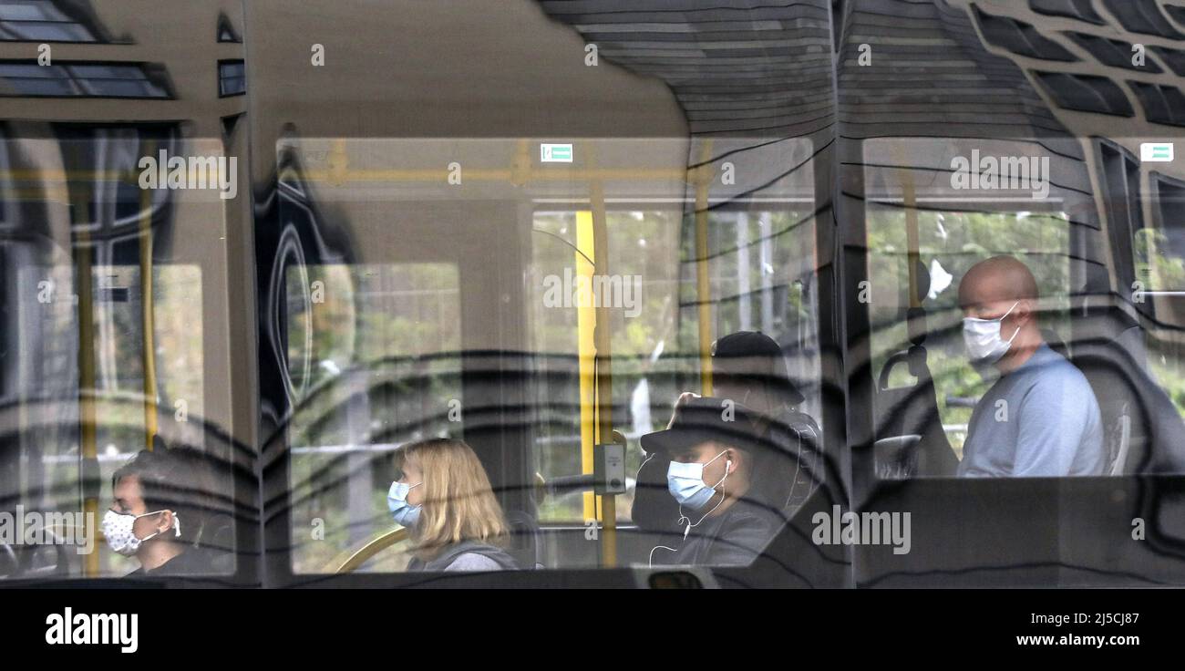 Passengers wearing face masks on a bus. In Germany, it is now mandatory