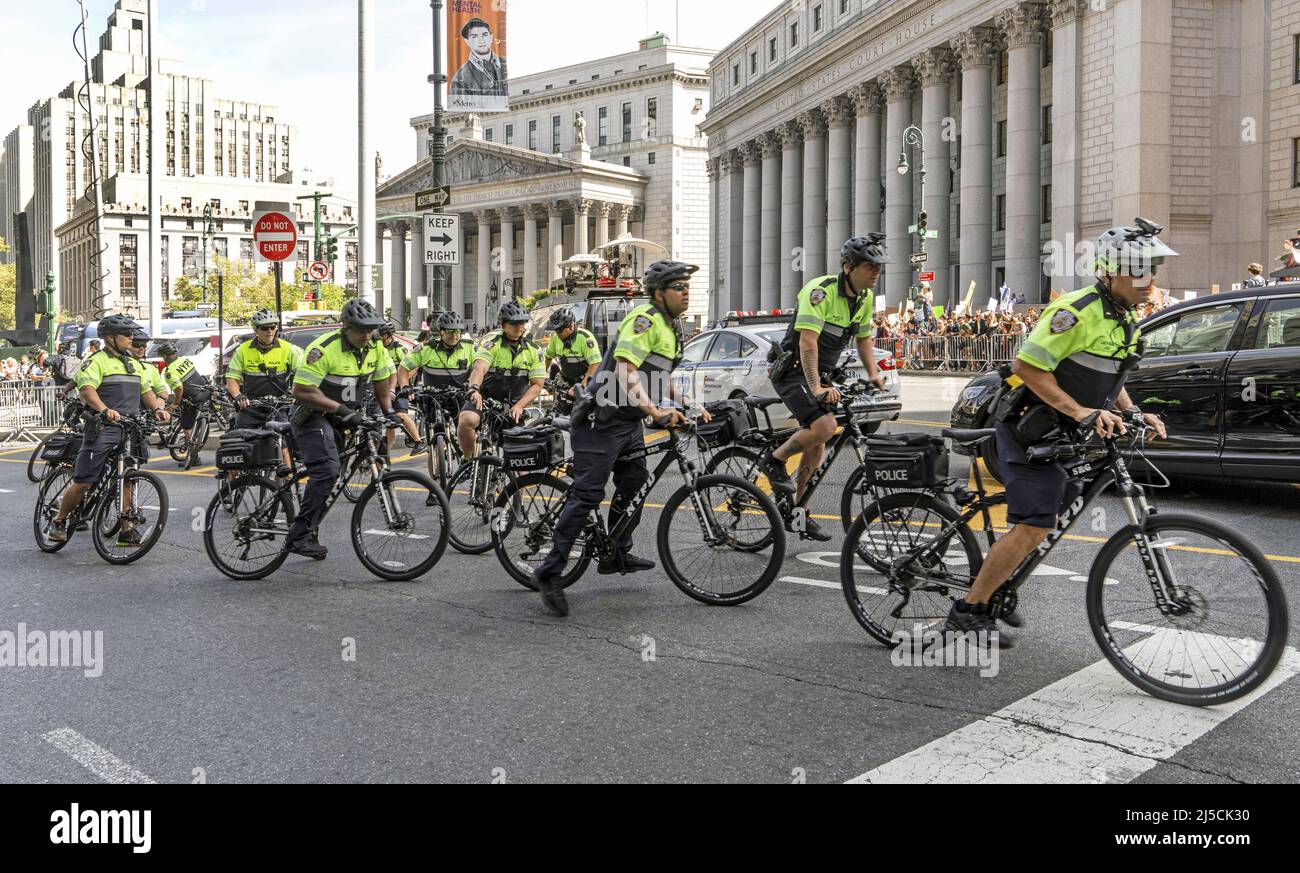 USA, New York, Sept. 20, 2019 New York City Global Climate Strike in New York on Sept. 20, 2019. police officers on bicycles. Thousands of New York City students walk out of school to participate in a rally on climate change. In what may be the largest climate protest in history, inspired by young Swedish activist Greta Thunberg. [automated translation] Stock Photo