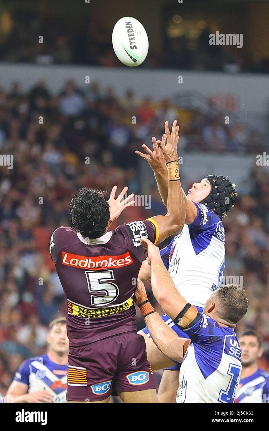 Brisbane, Australia. 22nd Apr, 2022. Selwyn Cobbo of the Brisbane Broncos  and Matt Burton of the Canterbury-Bankstown Bulldogs are seen jumping  Credit: News Images /Alamy Live News Stock Photo - Alamy