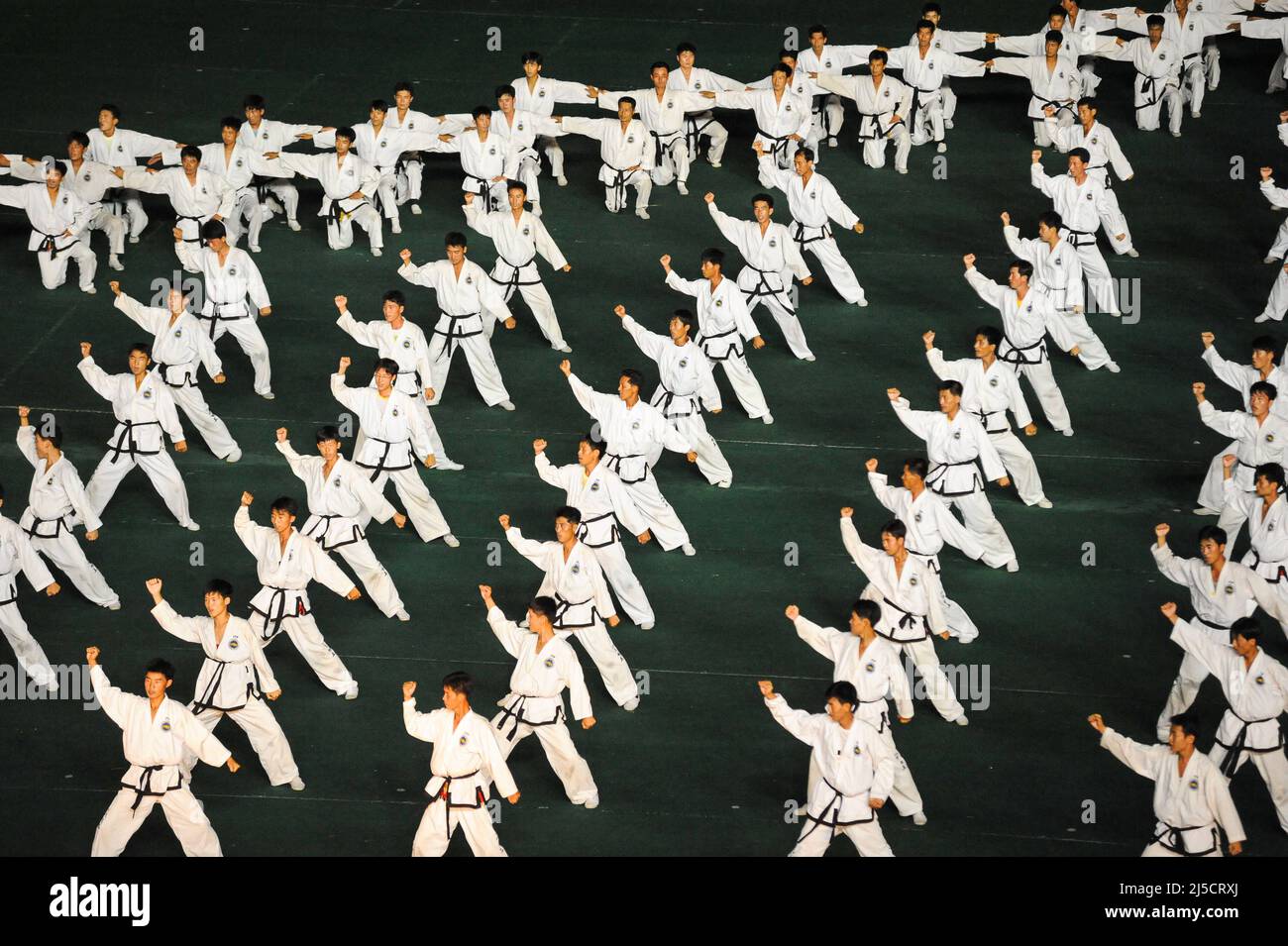08.08.2012, Pjoengjang, North Korea, Asia - mass choreography and performance of taekwondo fighters at the First of May Stadium during the Arirang Festival and Mass Games in the North Korean capital. [automated translation] Stock Photo