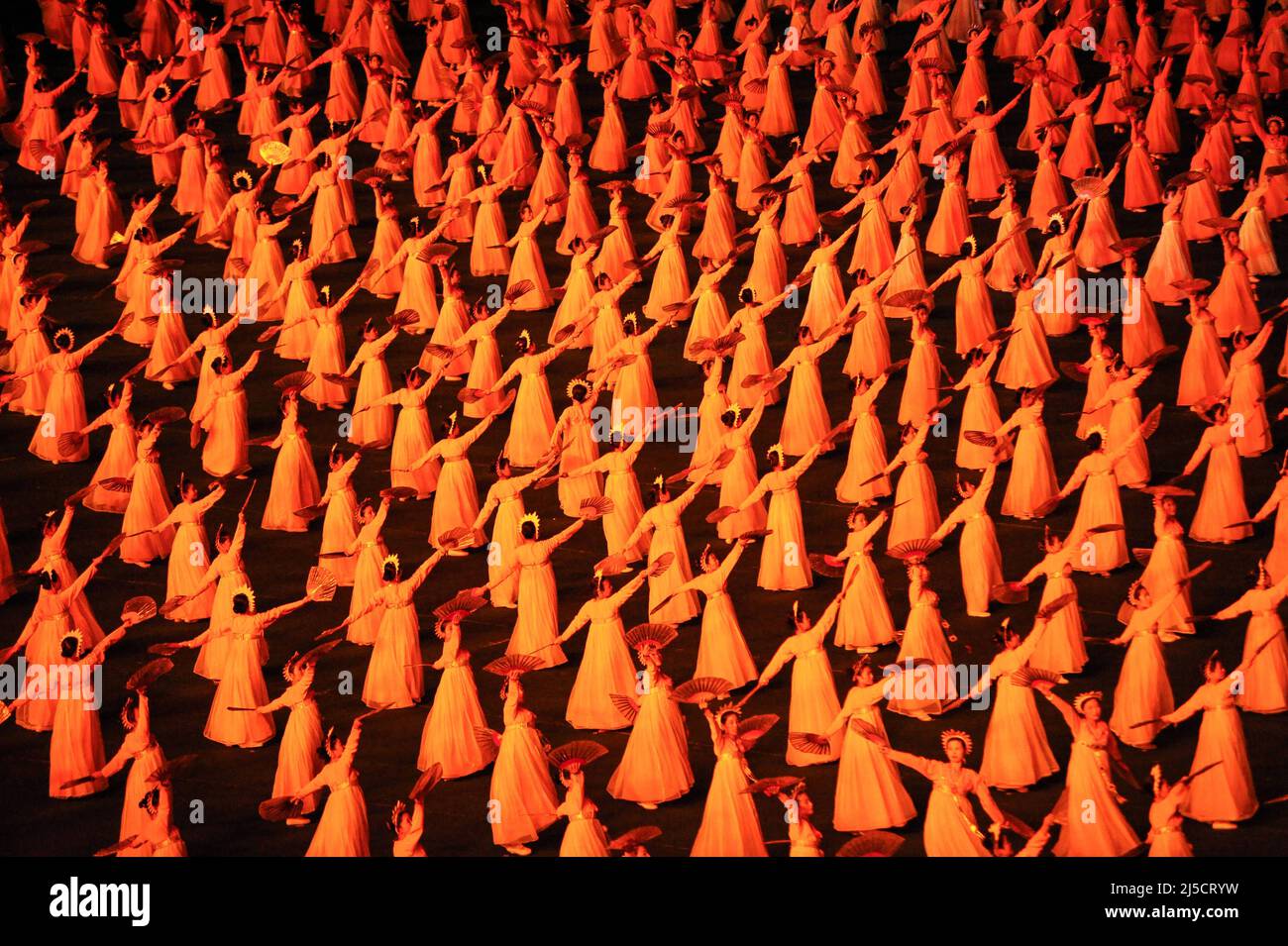 08.08.2012, Pjoengjang, North Korea, Asia - Mass choreography and artistic performance with dancers and acrobats at the First of May Stadium during the Arirang Festival and Mass Games in the North Korean capital. [automated translation] Stock Photo