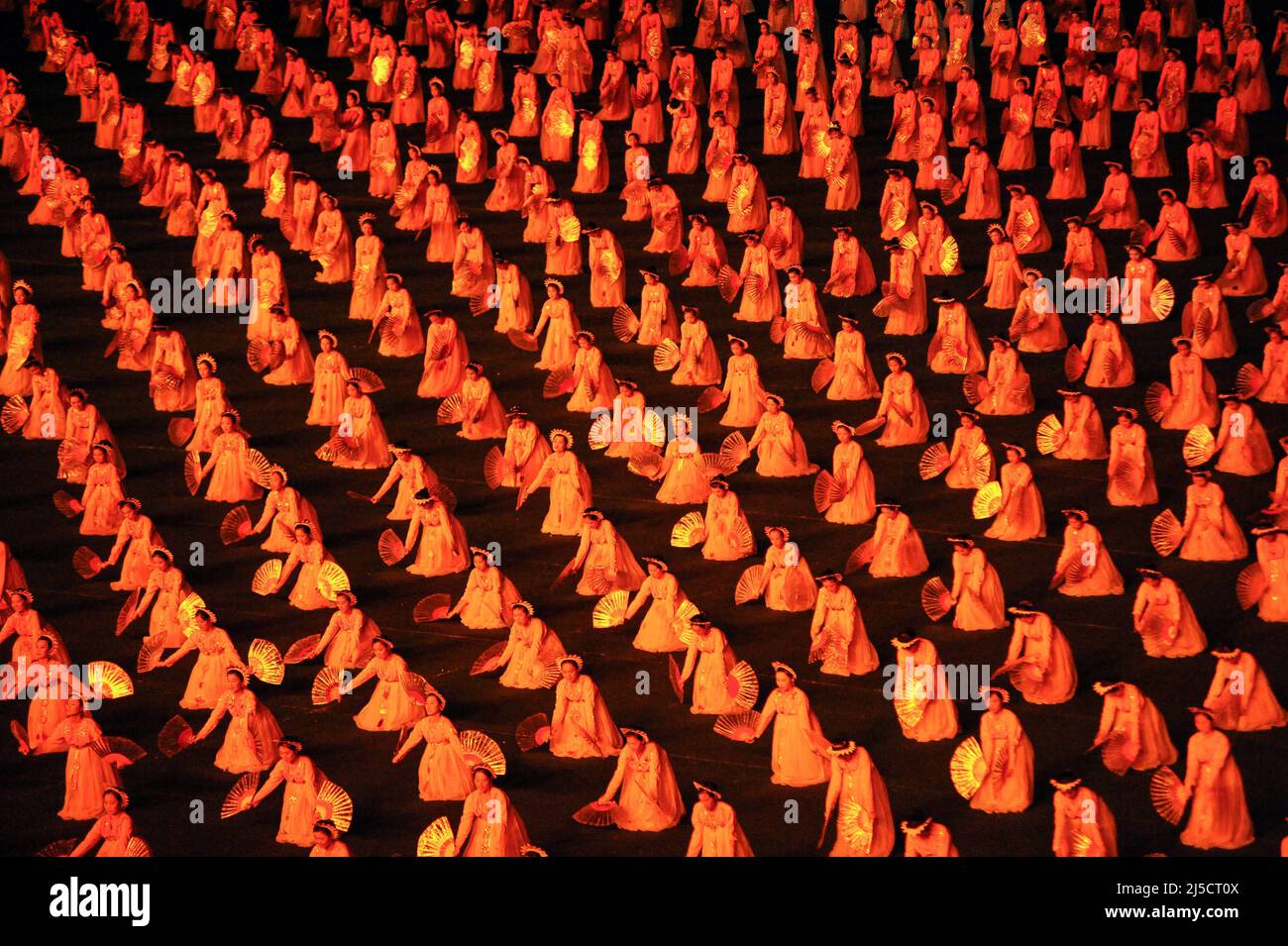 08.08.2012, Pjoengjang, North Korea, Asia - Mass choreography and artistic performance with dancers and acrobats at the First of May Stadium during the Arirang Festival and Mass Games in the North Korean capital. [automated translation] Stock Photo