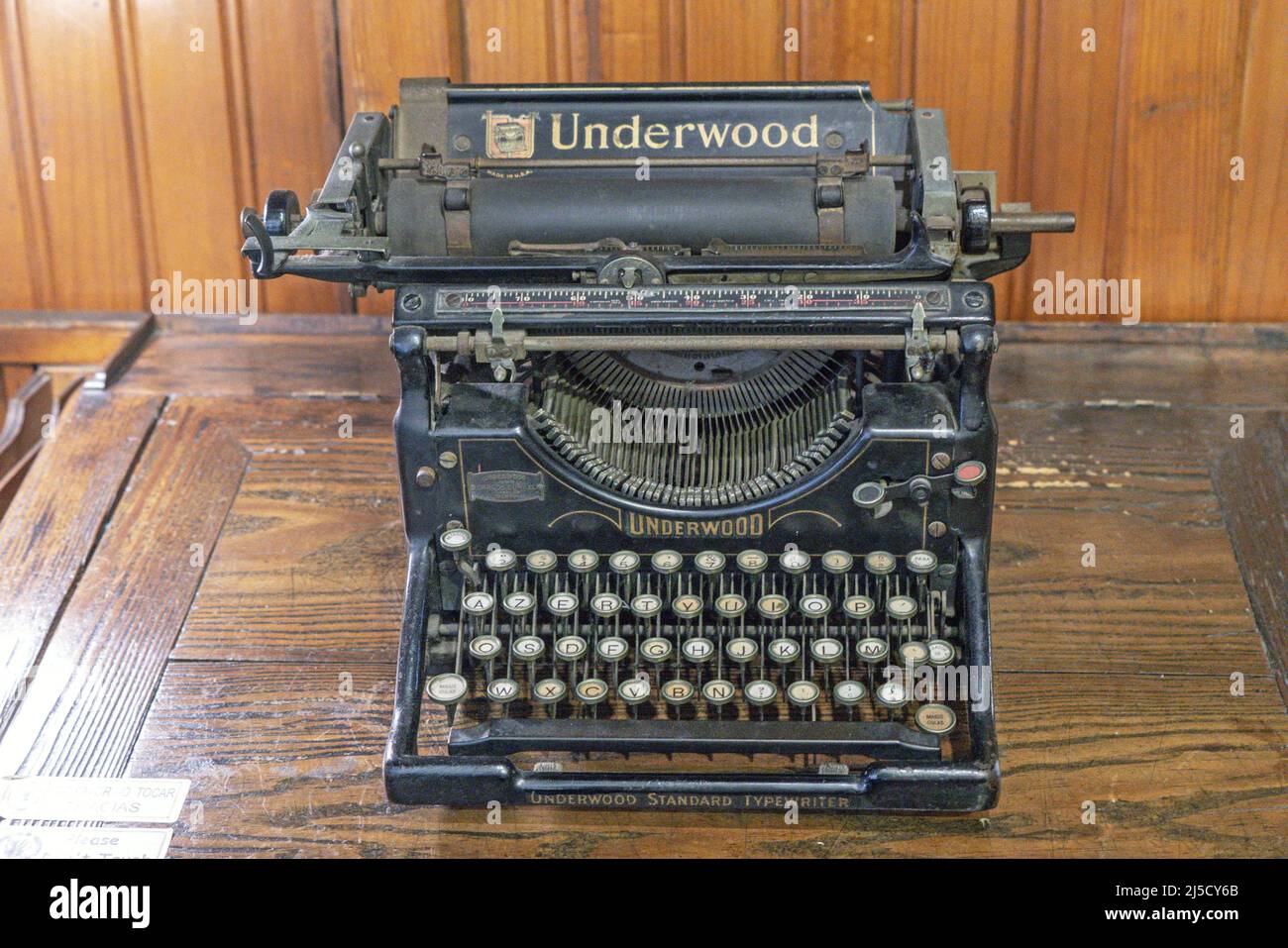 Portugal, Porto, 21.07.2020. Fernandez, Matos and Ca., Ltda. in Porto on 21.07.2020. Old typewriter. In the heart of the city center of Porto, Fernandes, Mattos and Ca., Lda. was founded back in 1886 as a renowned fabric shop. It is in the hands of the heirs of the first owners and still preserves all the atmosphere and architecture of this old building and its unique interior. The shop is now a magical space filled with traditional Portuguese toys, decorative pieces and contemporary vintage design, items. Desk. [automated translation] Stock Photo