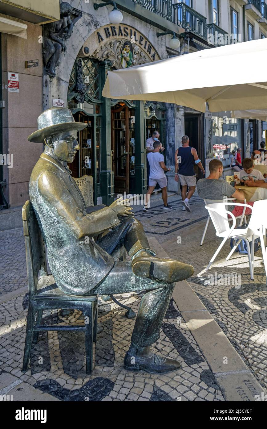 Portugal, Lisbon, 29.07.2020. Statue of Fernando Pessoa in front of the coffee a Brasileira in the Chiado neighborhood on 29.07.2020. A work of the Portuguese artist Antonio Augusto Lagoa Henriques. A Brasileira is a cafe in the Portuguese capital Lisbon from the late Belle Epoque (1905). [automated translation] Stock Photo