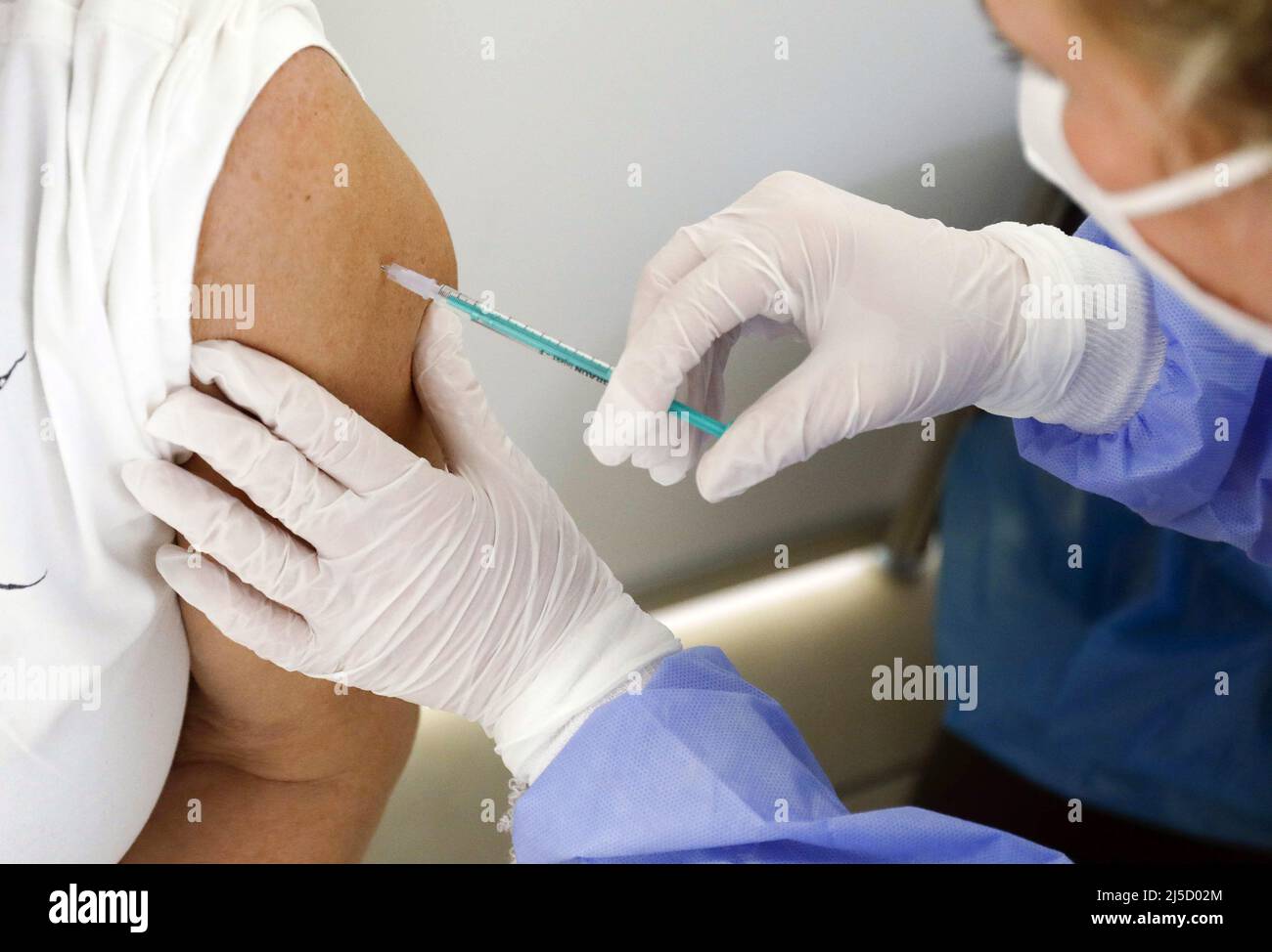 Schoenefeld, DEU, Feb. 15, 2021 - Vaccination with Covid19 Biontech Pfizer vaccine at the Vaccination Center in Terminal 5 of BER Airport. [automated translation] Stock Photo