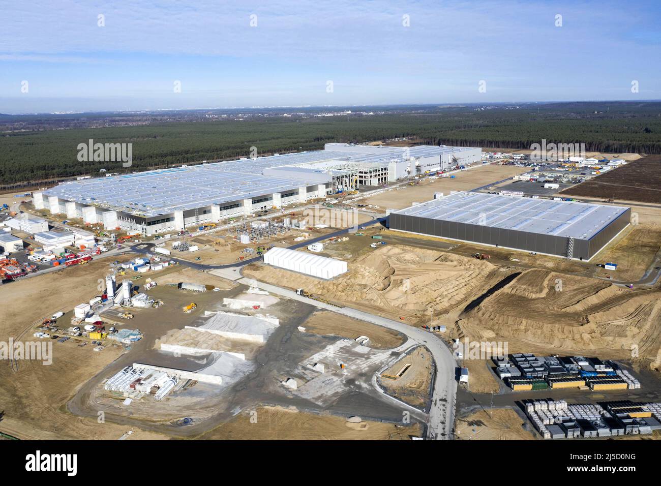 Gruenheide, DEU, 22.03.2021 - Aerial view of the Tesla Gigafactory construction site in the Freienbrink district of Gruenheide. From summer 2021, 500,000 electric cars per year are to be produced here. [automated translation] Stock Photo