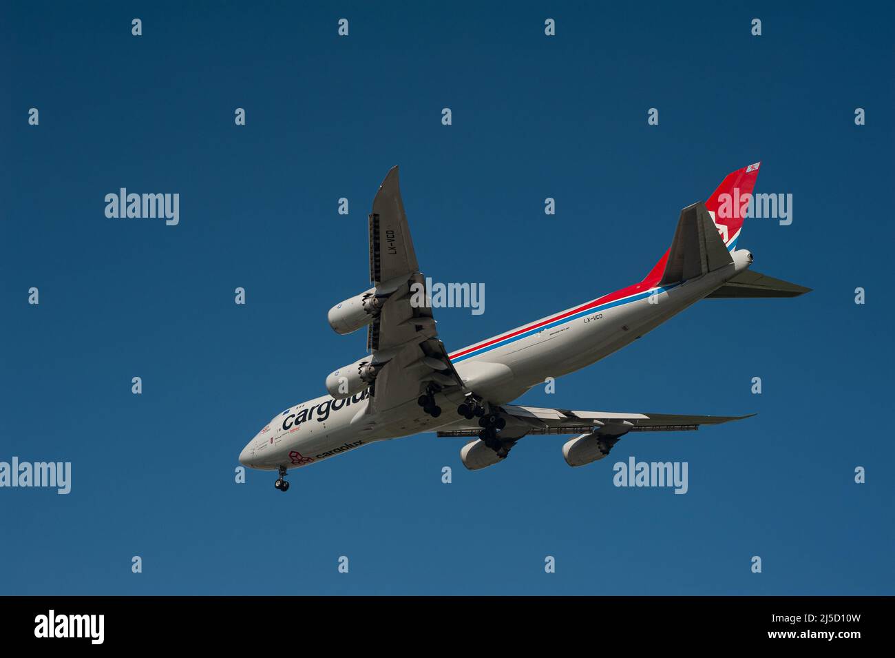 Apr. 07, 2021, Singapore, Republic of Singapore, Asia - A Cargolux Airlines Boeing 747-8F cargo aircraft with registration LX-VCD and the name City of Luxembourg on approach to Changi International Airport during the ongoing Corona crisis. [automated translation] Stock Photo