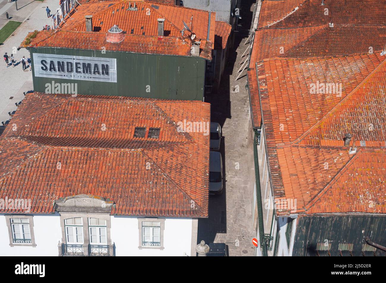14.06.2018, Porto, Portugal, Europe - Old buildings with red brick roofs of the famous and traditional winery Sandeman along the waterfront of the Douro River in Vila Nova de Gaia. [automated translation] Stock Photo
