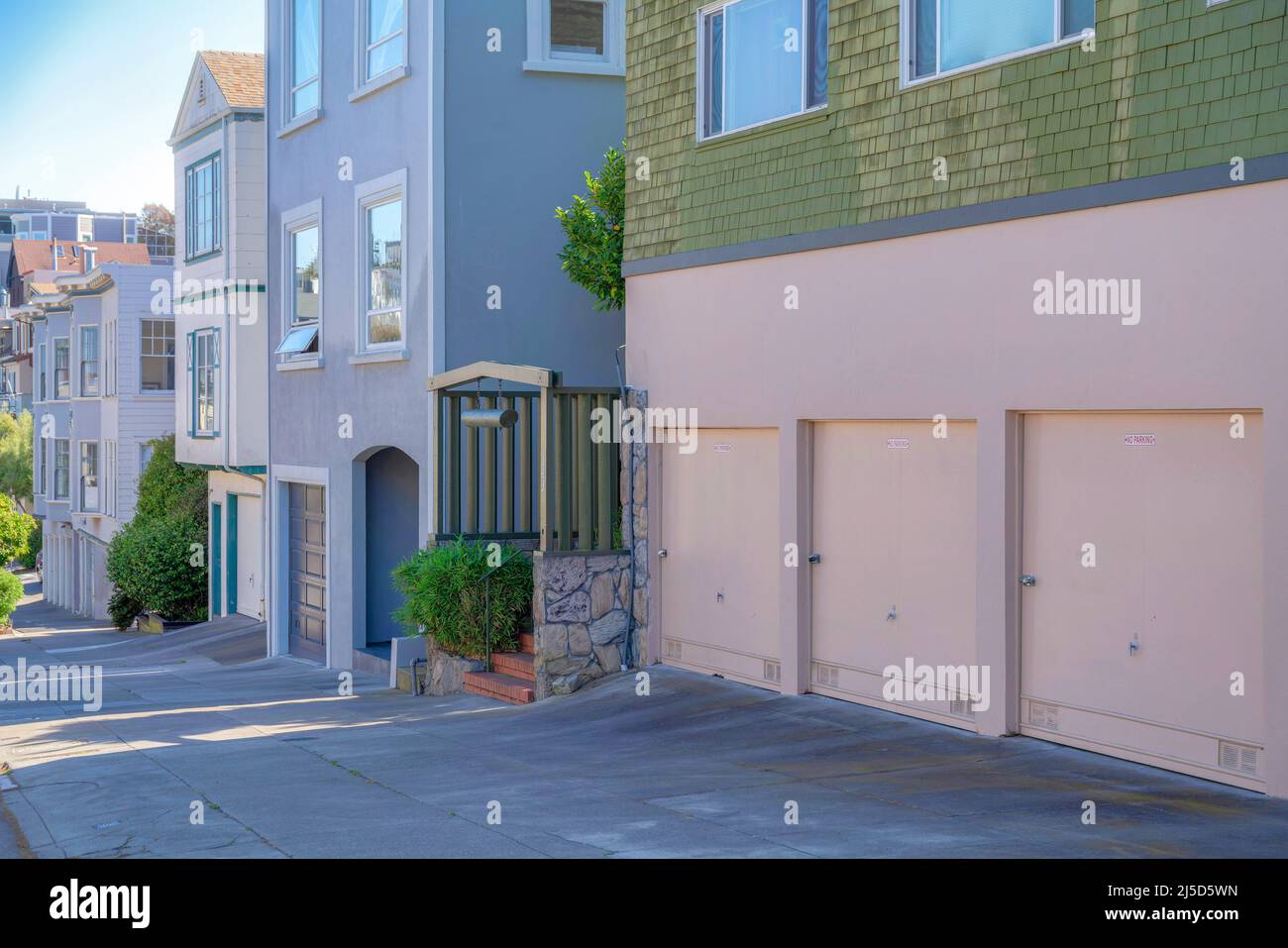 San Francisco residential buildings on a sloped street in California ...