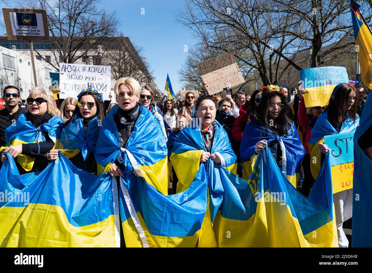 '04/16/2022, Berlin, Germany, Europe - Ukrainian women protest during a demonstration under the slogan ''March for true Peace in Ukraine'' as part of the alternative Easter March, which is directed against Russian military aggression in the two wars in Ukraine and Syria. The demonstrators demand further sanctions against Russia and more support from the West in the form of defensive weapons, as well as the immediate boycott of energy imports from Russia such as oil and gas. [automated translation]' Stock Photo