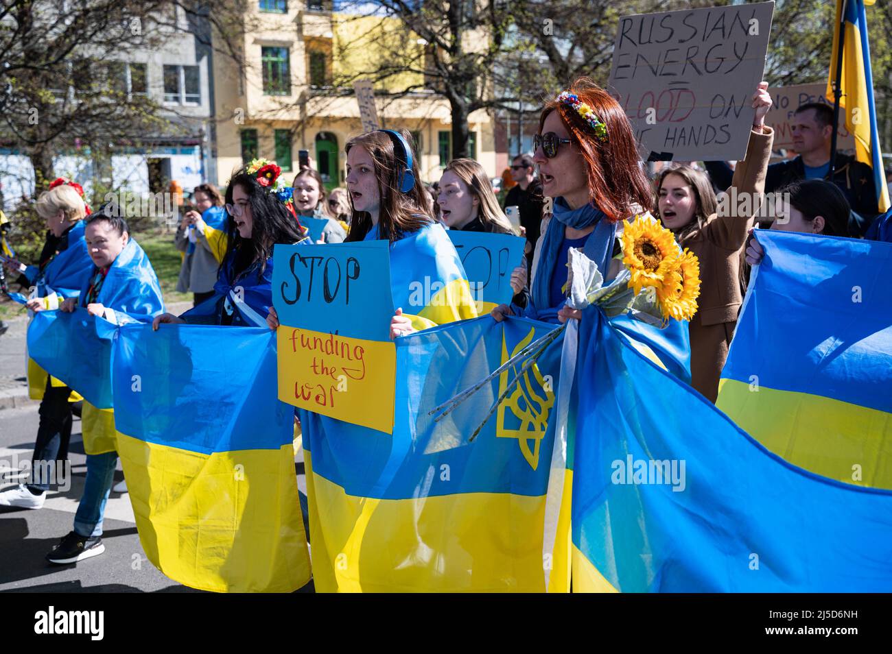 '04/16/2022, Berlin, Germany, Europe - Ukrainian women protest during a demonstration under the slogan ''March for true Peace in Ukraine'' as part of the alternative Easter March, which is directed against Russian military aggression in the two wars in Ukraine and Syria. The demonstrators demand further sanctions against Russia and more support from the West in the form of defensive weapons, as well as the immediate boycott of energy imports from Russia such as oil and gas. [automated translation]' Stock Photo