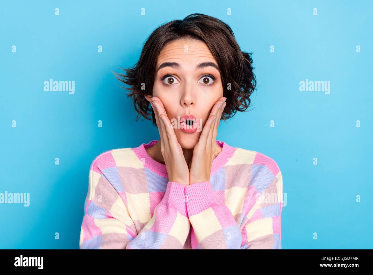 Photo of young astonished girl hands touch cheeks fake novelty afraid ...