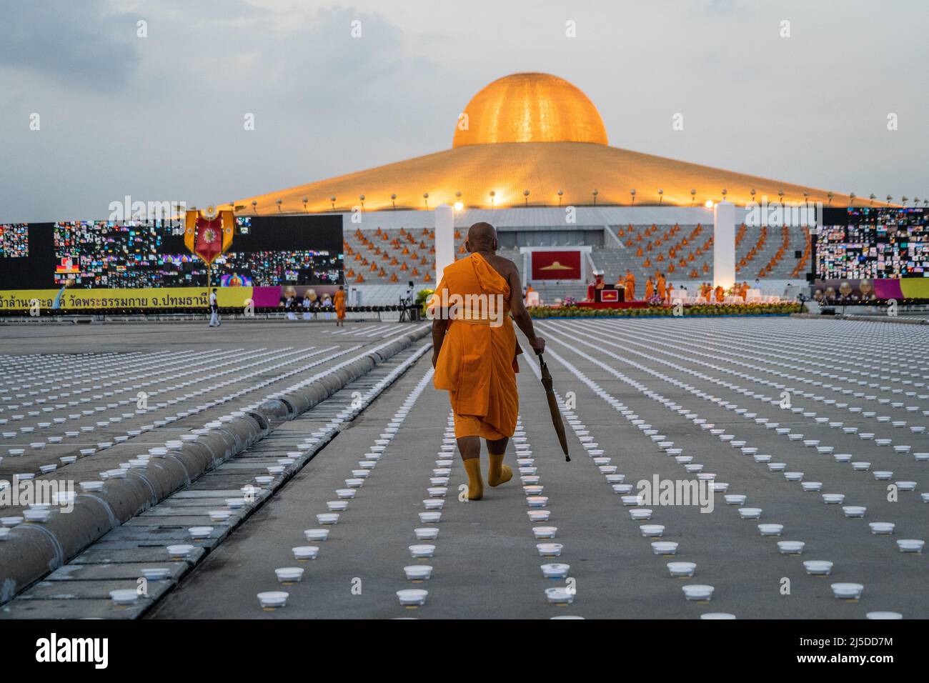 Pathum Thani Thailand 22nd Apr 22 A Monk Walks Through A Sea Of Led Lanterns During The Earth Day 22 Celebration At Wat Phra Dhammakaya Temple Wat Phra Dhammakaya Temple Celebrates Earth Day