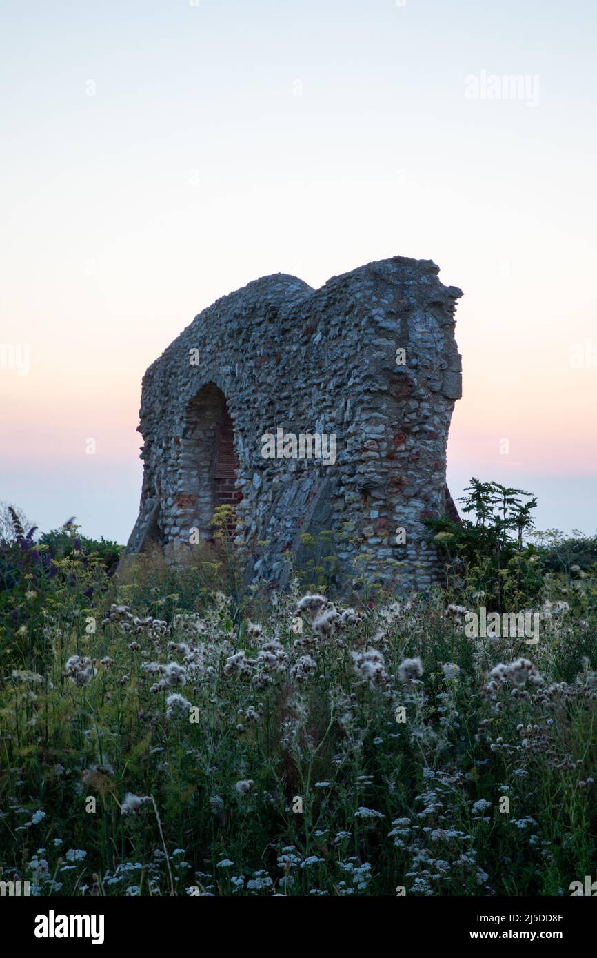 The arched remains of the old abbey at Hunstanton in Norfolk at sunset. Stock Photo