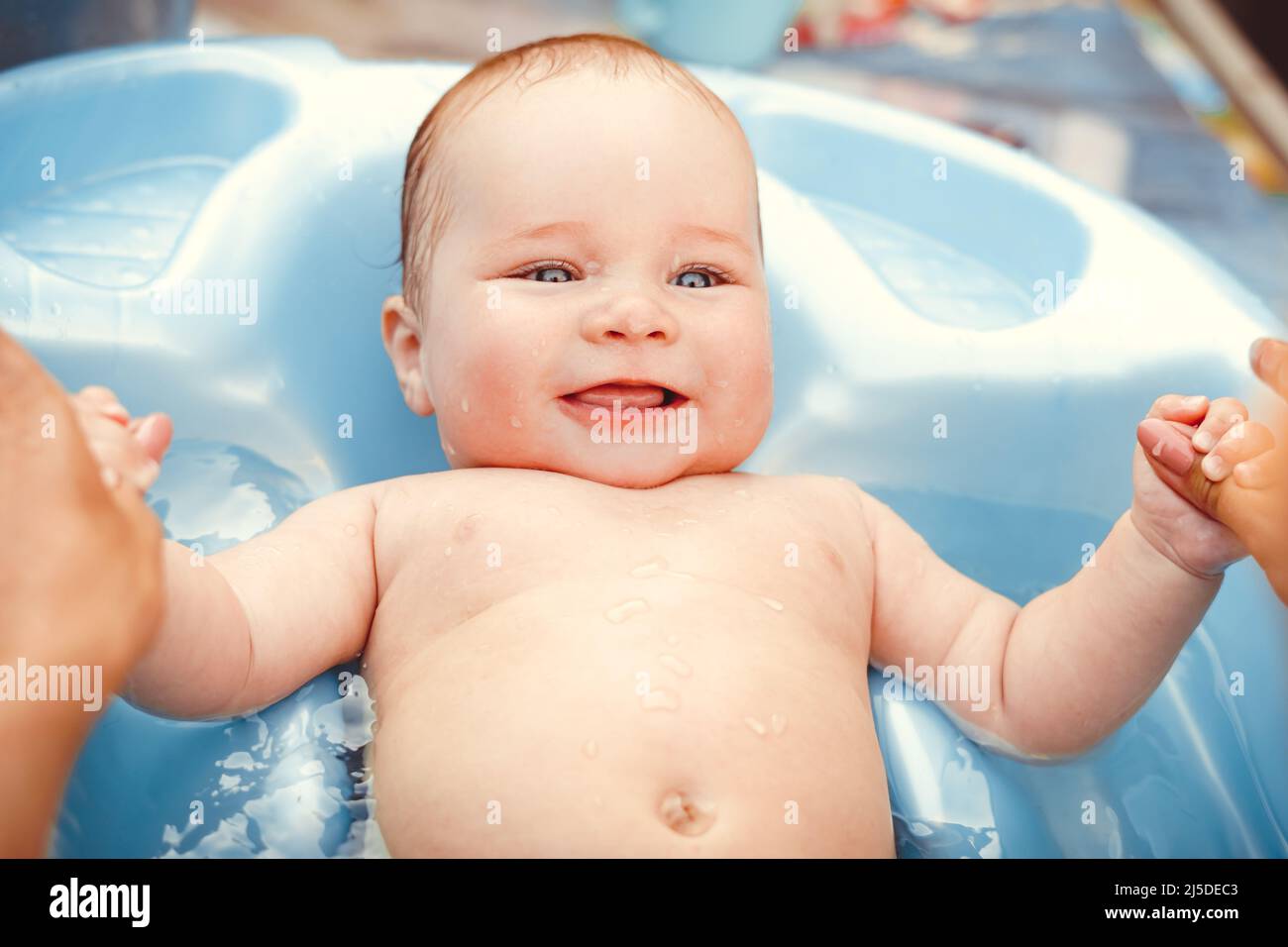 baby-boy-bathed-in-the-outdoor-tub-stock-photo-alamy