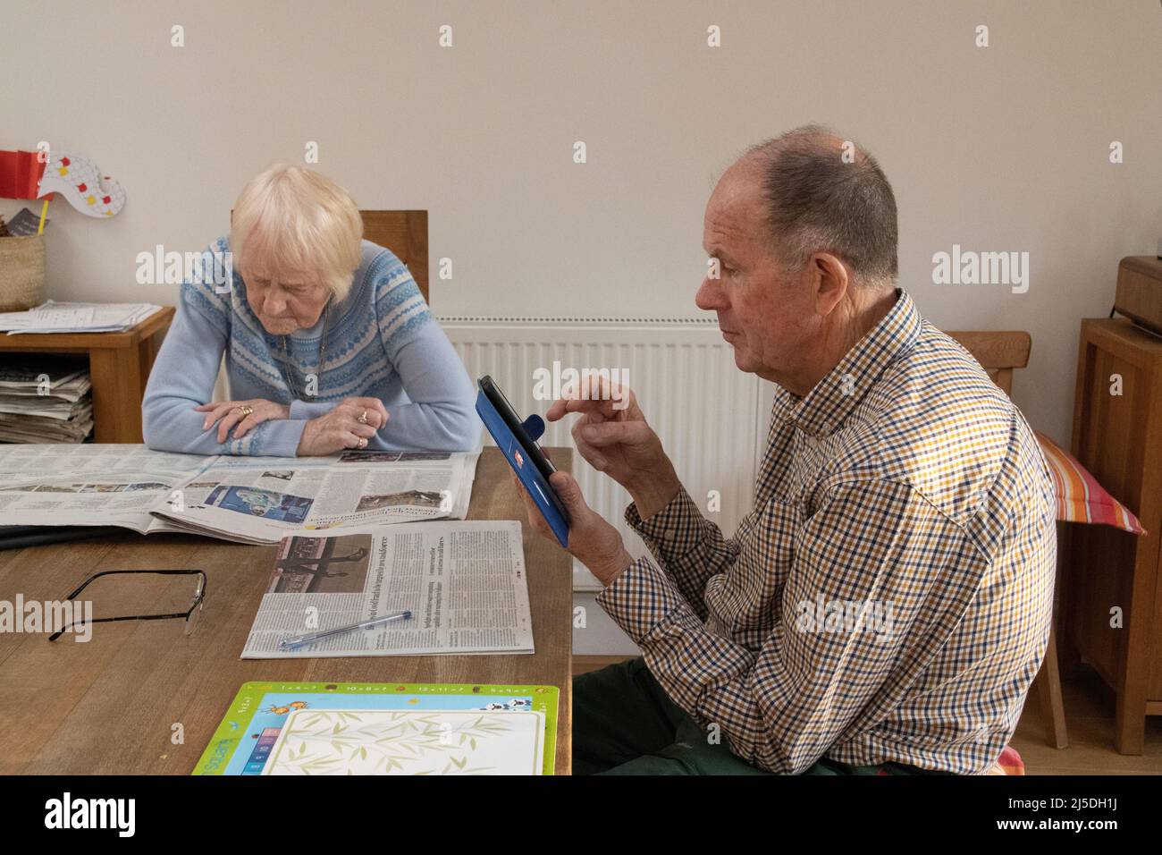 Elderly couple dining table hi-res stock photography and images - Alamy