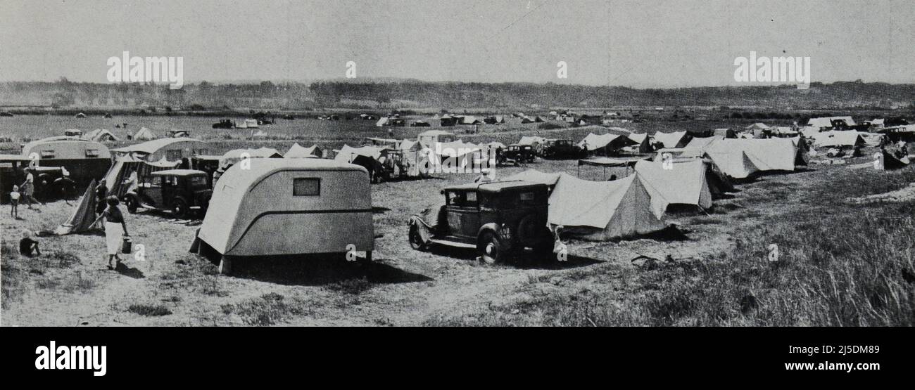 Eng translation " A village of cars and tents near a beautiful