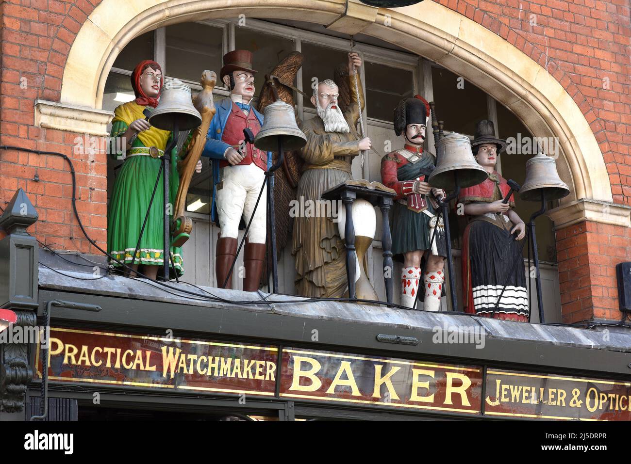 Victorian shopfront of Jeweller Baker and Son with famous Baker's Clock, Southgate Street, Gloucester, England, UK Stock Photo
