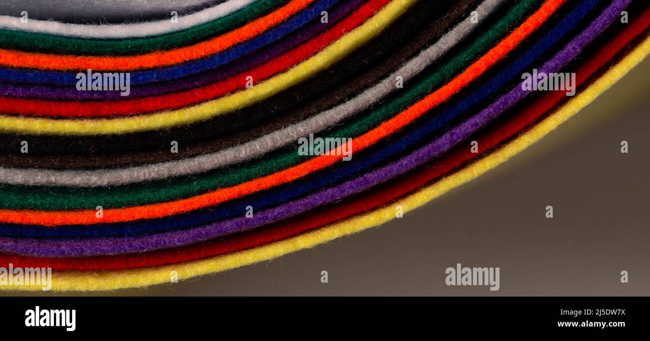 Several colored felt texture background. Assorted color felt fabric sheets, patchwork, sewing DIY craft Stock Photo
