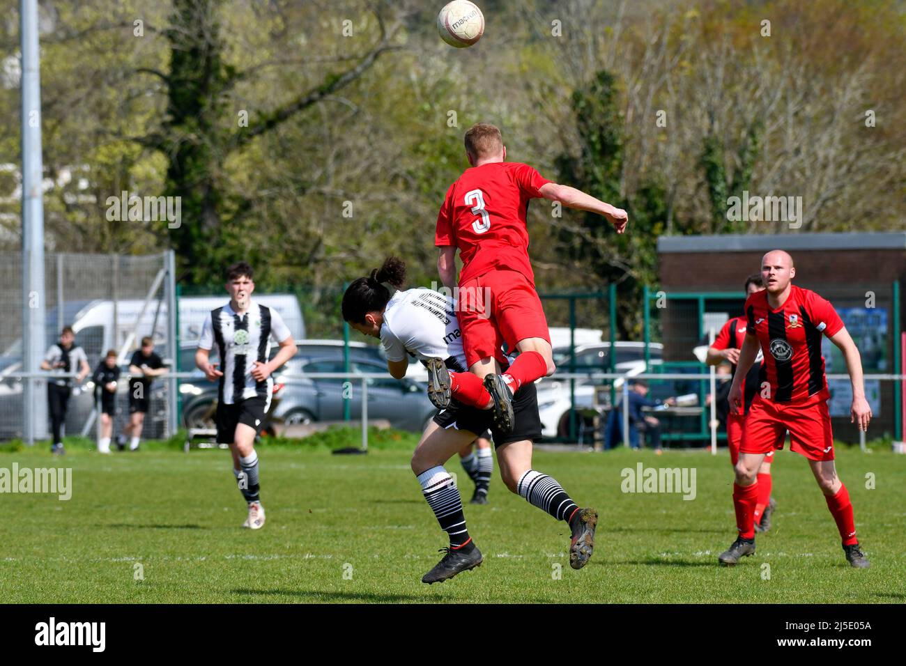 Pontardawe, Wales. 16 April 2022. Gareth Emmanuel of Dinas Powys jumps highest to win the header