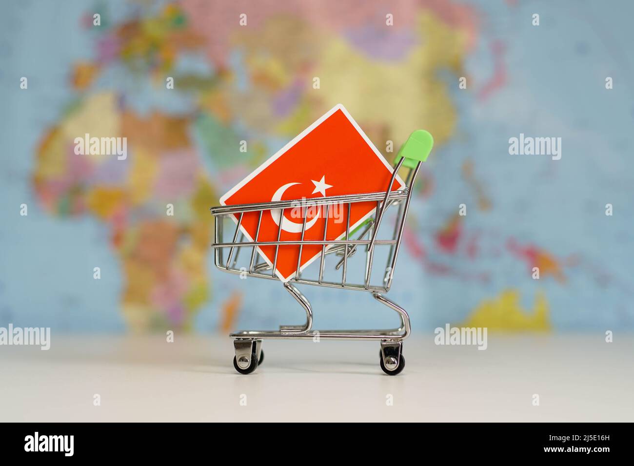 Turkish national flag in miniature shopping trolley cart. Shopping