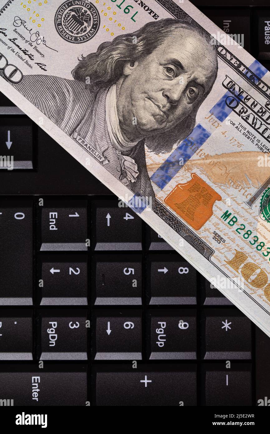 100 dollar banknote on black computer keyboard for design purpose Stock ...