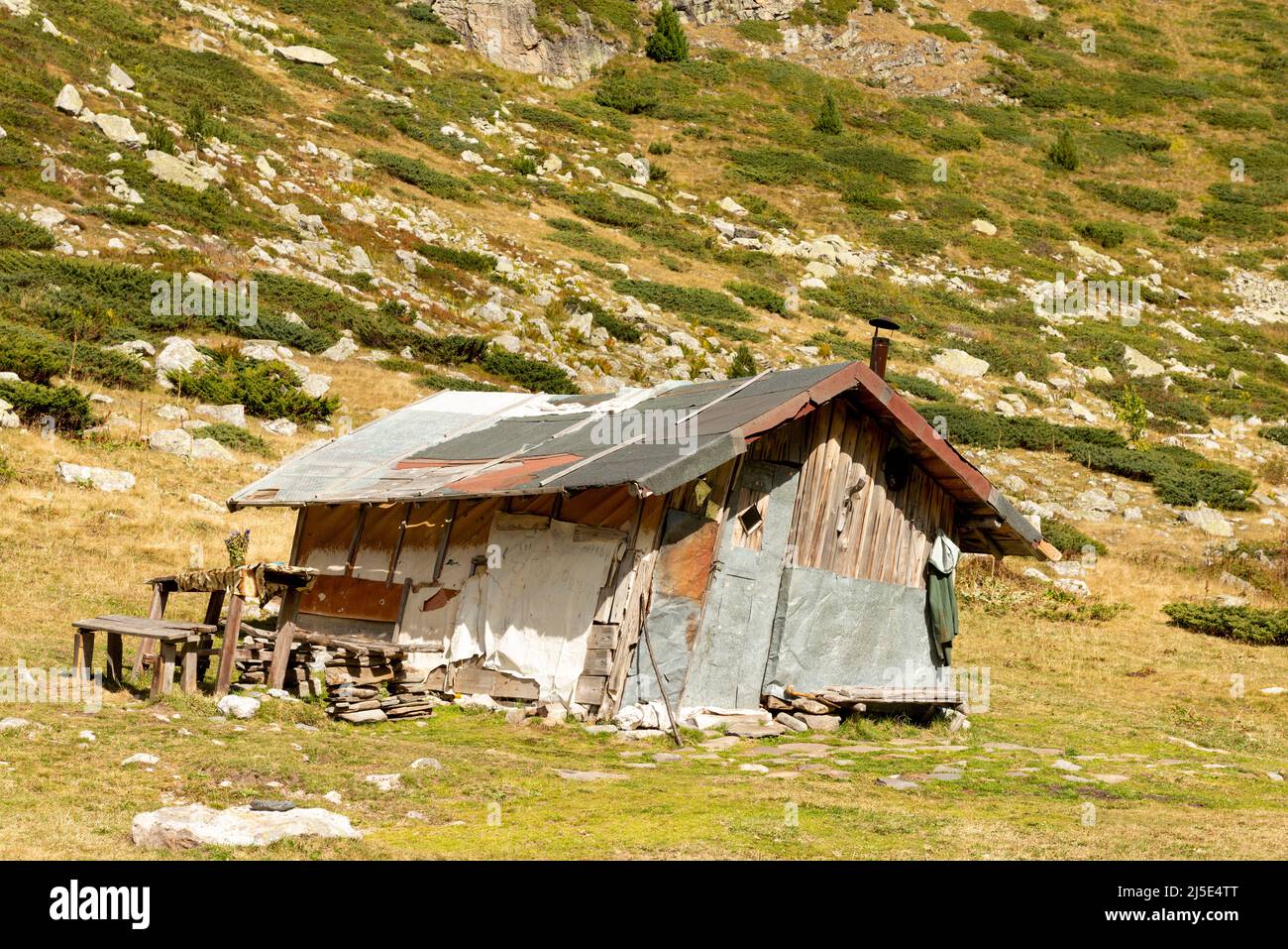 Old crooked tilted shelter in the Urdini Lakes valley, Rila Mountain, Bulgaria Stock Photo