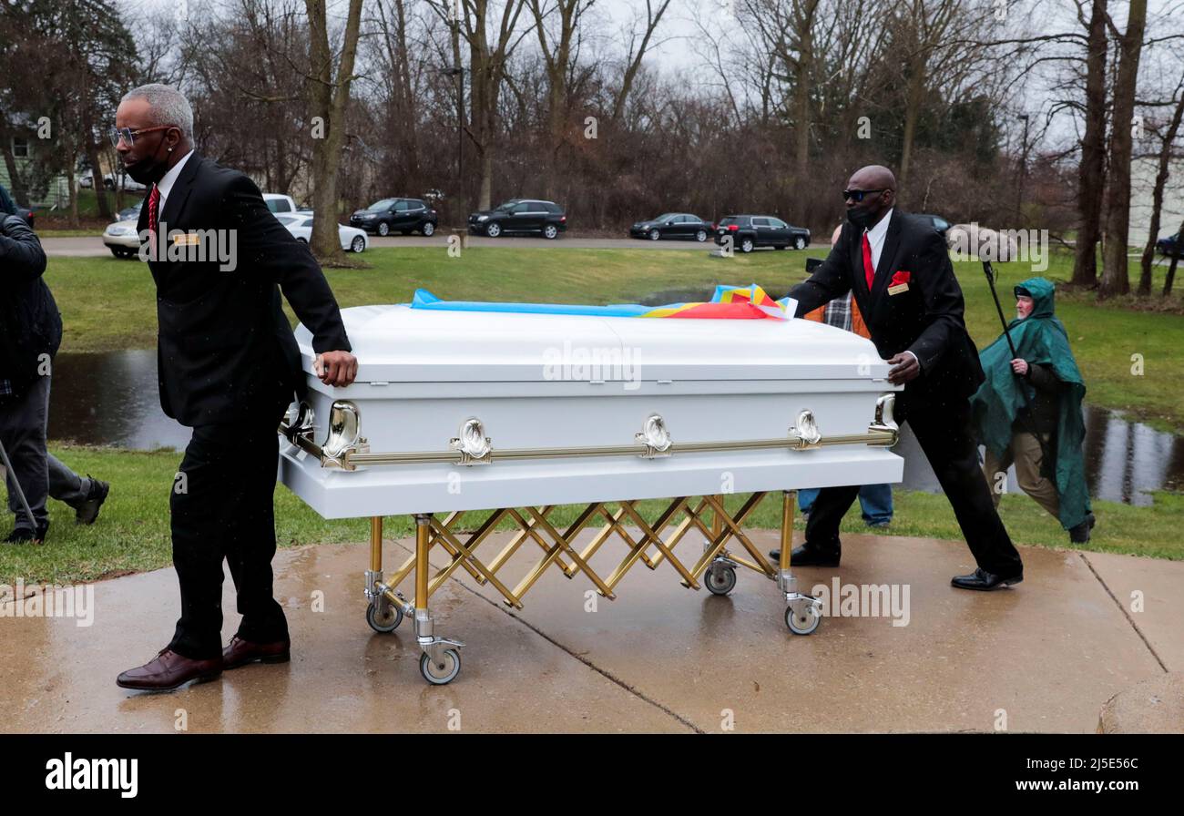 The casket with the remains of Patrick Lyoya, an unarmed Black man who was shot and killed by a Grand Rapids Police officer during a traffic stop on April 4, is taken from the sanctuary following the funeral at Renaissance Church of God in Christ in Grand Rapids, Michigan, U.S., April 22, 2022. REUTERS/Rebecca Cook Stock Photo