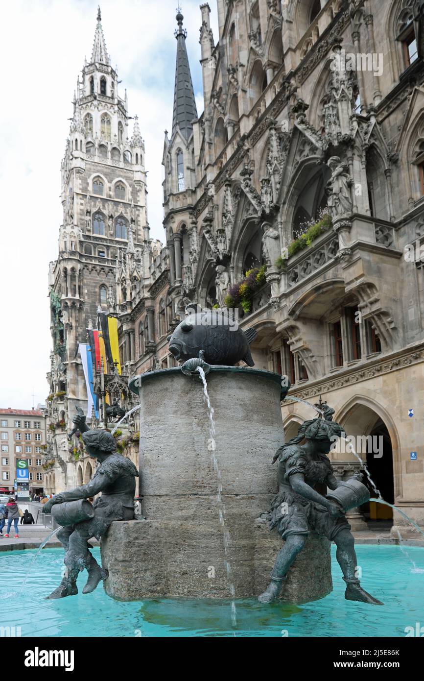 Munich, Munich, Germany - August 26, 2021: Fountain of Fish called Fischbrunnen in German language in the main square Marienplatz  and the Rathaus Stock Photo