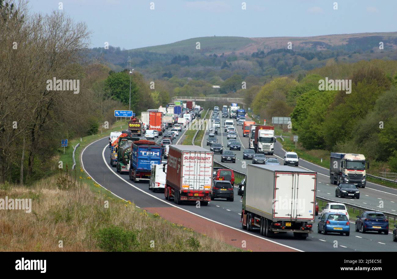 Slow moving traffic on M6 motorway in Lancashire countryside near Garstang with Northbound carriageway practically at a standstill 22nd April 2022. Stock Photo