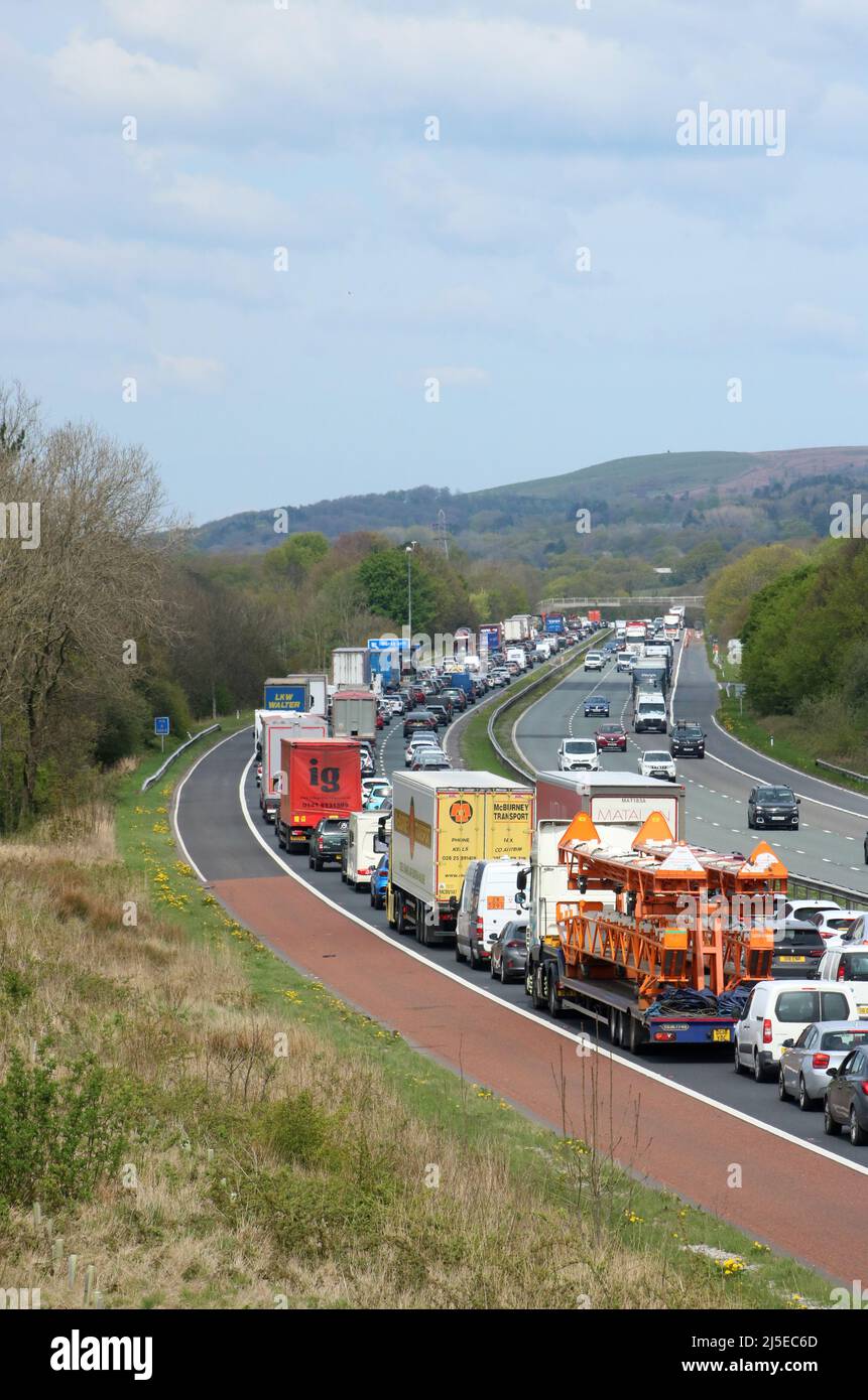 Slow moving traffic on M6 motorway in Lancashire countryside near Garstang with Northbound carriageway practically at a standstill 22nd April 2022. Stock Photo