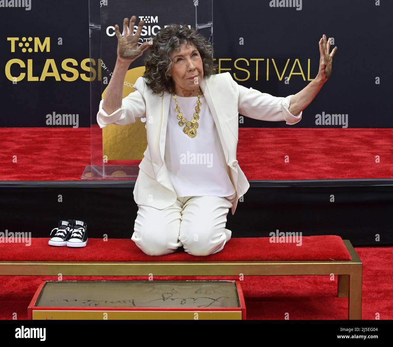 Los Angeles, USA. 22nd Apr, 2022. Actress Lily Tomlin participates in a hand and footprint ceremony immortalizing her in the forecourt of the TCL Chinese Theatre (formerly Grauman's) in the Hollywood section of Los Angeles on Friday, April 22, 2022. Photo by Jim Ruymen/UPI Credit: UPI/Alamy Live News Stock Photo