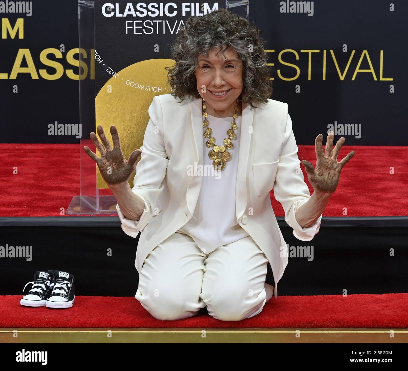 Los Angeles, USA. 22nd Apr, 2022. Actress Lily Tomlin participates in a hand and footprint ceremony immortalizing her in the forecourt of the TCL Chinese Theatre (formerly Grauman's) in the Hollywood section of Los Angeles on Friday, April 22, 2022. Photo by Jim Ruymen/UPI Credit: UPI/Alamy Live News Stock Photo