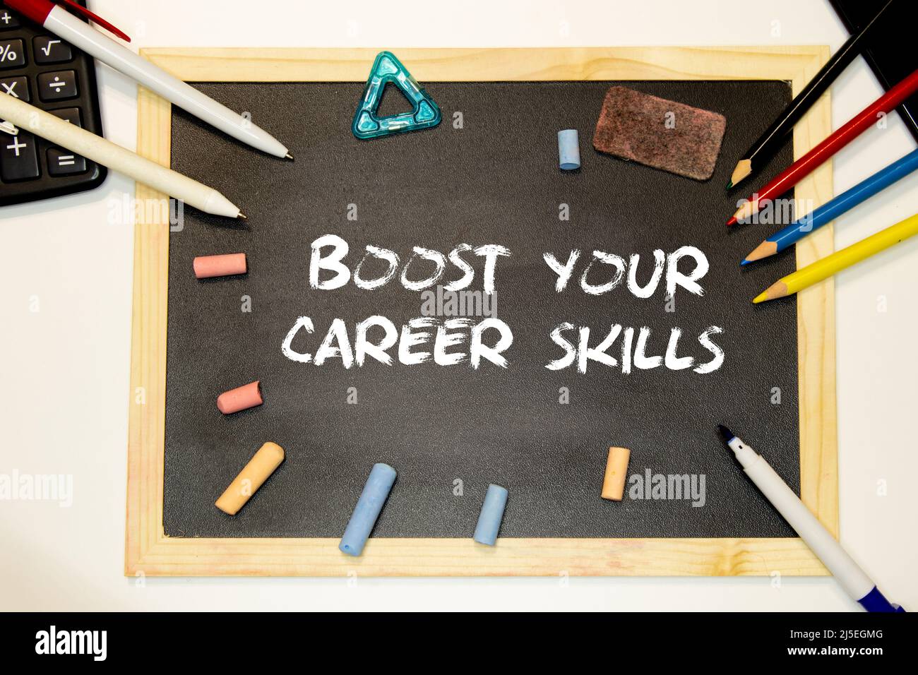 Business concept about Boost Your Career Skills with sign on the piece of paper. Stock Photo