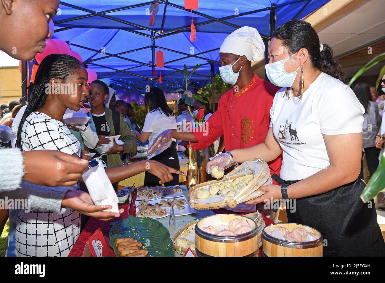 Windhoek, Namibia. 22nd Apr, 2022. People try traditional Chinese food